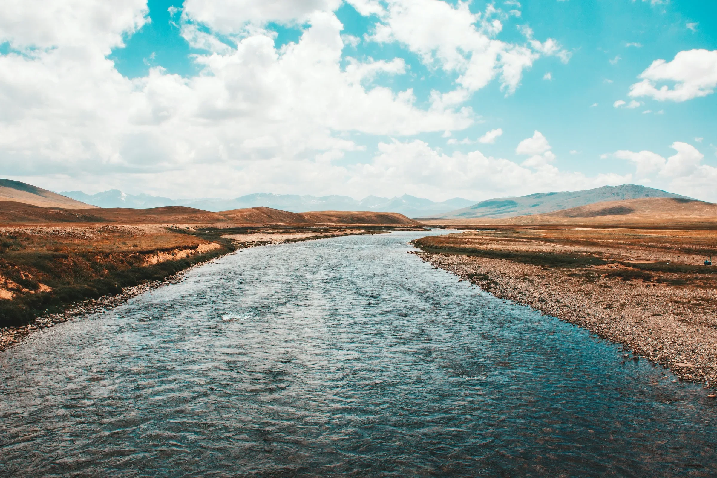 River flowing through the open plateau of Deosai National Park.